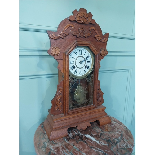 2028 - Early 20th C. oak gingerbread clock. {60 cm H x 37 cm W x 14 cm D}.