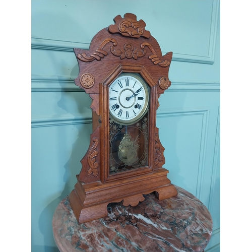 2028 - Early 20th C. oak gingerbread clock. {60 cm H x 37 cm W x 14 cm D}.