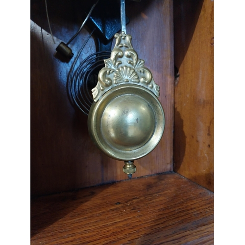 2028 - Early 20th C. oak gingerbread clock. {60 cm H x 37 cm W x 14 cm D}.