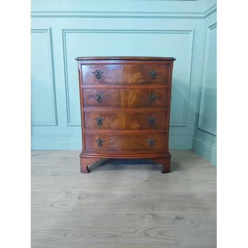 2031 - Mahogany bow fronted chest of drawers with four drawers raised on bracket feet. {77 cm H x 66 cm W x... 