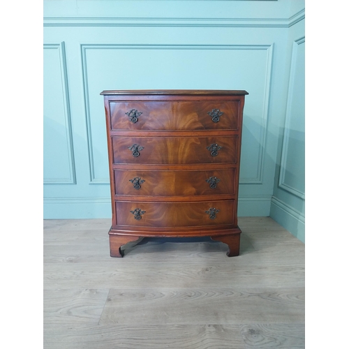 2031 - Mahogany bow fronted chest of drawers with four drawers raised on bracket feet. {77 cm H x 66 cm W x... 