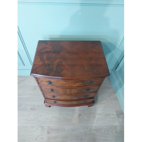 2031 - Mahogany bow fronted chest of drawers with four drawers raised on bracket feet. {77 cm H x 66 cm W x... 