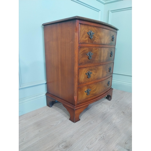 2031 - Mahogany bow fronted chest of drawers with four drawers raised on bracket feet. {77 cm H x 66 cm W x... 