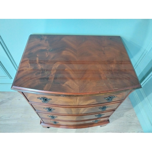 2031 - Mahogany bow fronted chest of drawers with four drawers raised on bracket feet. {77 cm H x 66 cm W x... 