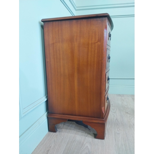 2031 - Mahogany bow fronted chest of drawers with four drawers raised on bracket feet. {77 cm H x 66 cm W x... 