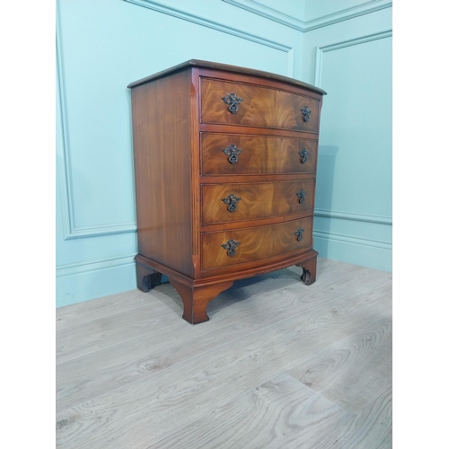 2031 - Mahogany bow fronted chest of drawers with four drawers raised on bracket feet. {77 cm H x 66 cm W x... 