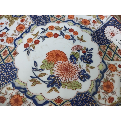 2034 - Oriental ceramic plate with floral design {31 cm Dia.}.