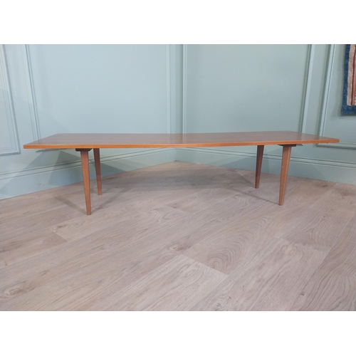 2035 - Mid Century teak coffee table on square tapered legs. {34 cm H x 138 cm W x 46 cm D}.