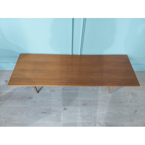 2035 - Mid Century teak coffee table on square tapered legs. {34 cm H x 138 cm W x 46 cm D}.