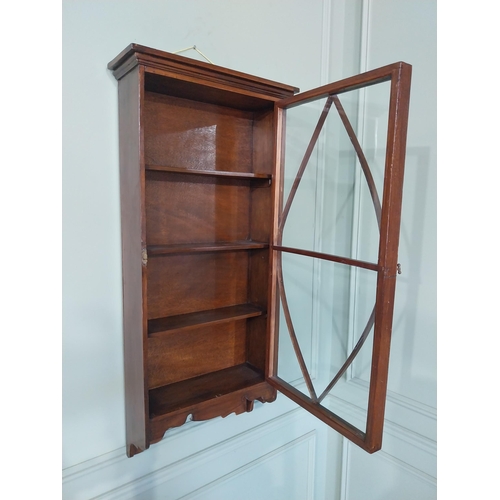 2036 - 19th C. mahogany wall cabinet with single glazed door {110 cm H x 48 cm W x 18 cm D}.