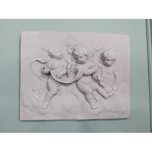 2049 - Decorative plaster wall plaque depicting Cherubs {38 cm H x 49 cm W}.