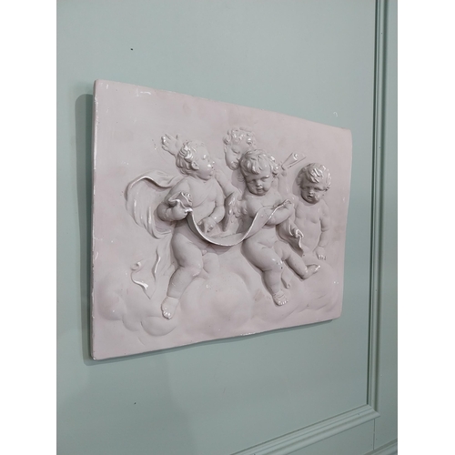 2049 - Decorative plaster wall plaque depicting Cherubs {38 cm H x 49 cm W}.