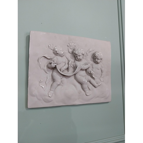 2049 - Decorative plaster wall plaque depicting Cherubs {38 cm H x 49 cm W}.