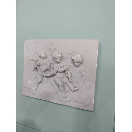 2049 - Decorative plaster wall plaque depicting Cherubs {38 cm H x 49 cm W}.