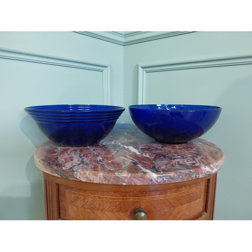 2053 - Two decorative blue glass bowls. {10 cm H x 25 cm Dia.}.