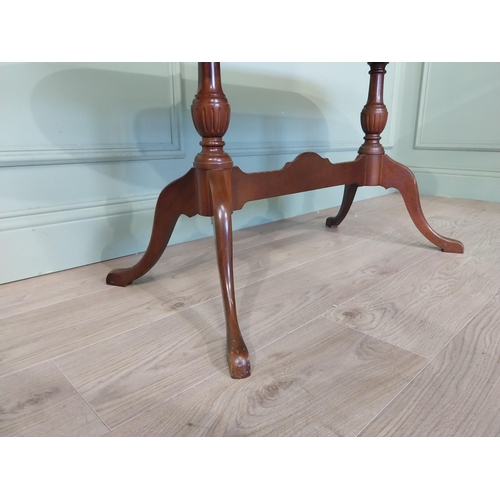 2054 - Mahogany coffee table, raised on turned supports and single stretcher. { 53cm H X 114cm W X 46cm D }... 