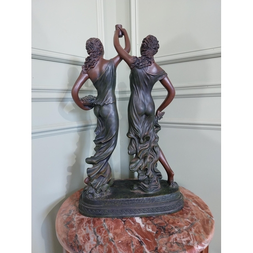 2058 - Resin sculpture of two Grecian ladies {60 cm H 34 cm W x 17 cm D}.