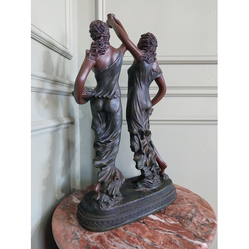 2058 - Resin sculpture of two Grecian ladies {60 cm H 34 cm W x 17 cm D}.