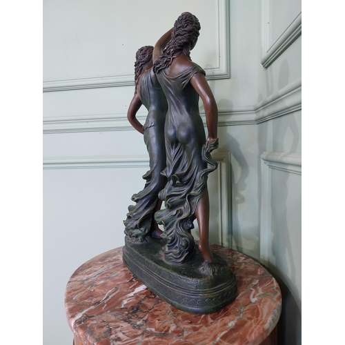 2058 - Resin sculpture of two Grecian ladies {60 cm H 34 cm W x 17 cm D}.