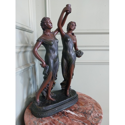 2058 - Resin sculpture of two Grecian ladies {60 cm H 34 cm W x 17 cm D}.