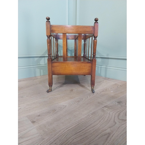 2059 - Mahogany canterbury in the Georgian style on brass casters. {44 cm H x 56 cm W x 36 cm D}.