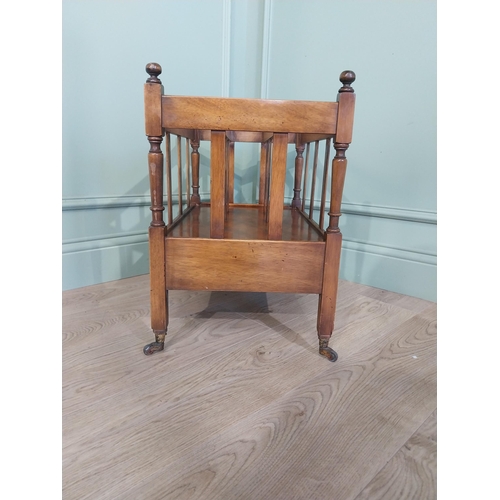 2059 - Mahogany canterbury in the Georgian style on brass casters. {44 cm H x 56 cm W x 36 cm D}.