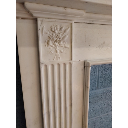 742 - Irish Georgian marble fire surround with central carved plaque depicting urns, rosettes, fruit and w... 