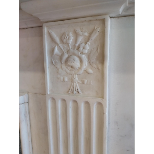 742 - Irish Georgian marble fire surround with central carved plaque depicting urns, rosettes, fruit and w... 