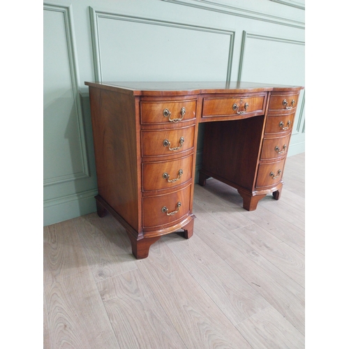 1185 - Good quality mahogany knee hole desk with eight short drawers and one long drawer in frieze raised o... 