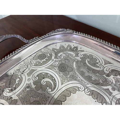 1209 - Good quality Edwardian silver plate serving tray {77 cm W x 46 cm D}.