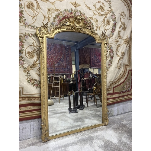 125 - 19th C. French decorative giltwood over mantle mirror {210 cm H x 143 cm W}.