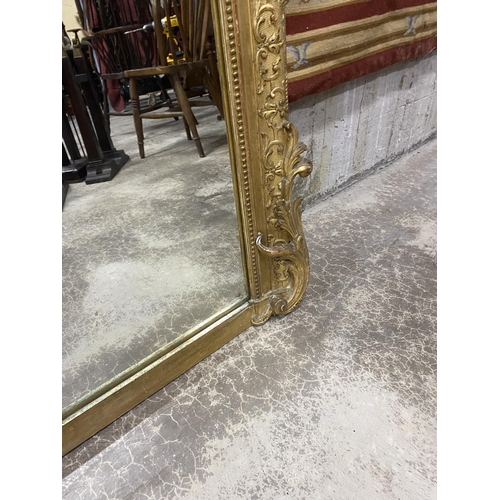 125 - 19th C. French decorative giltwood over mantle mirror {210 cm H x 143 cm W}.