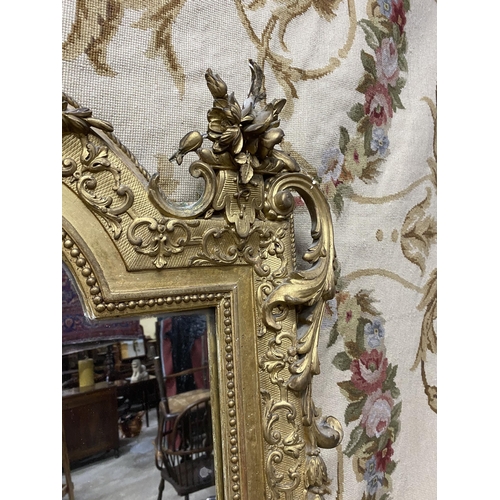 125 - 19th C. French decorative giltwood over mantle mirror {210 cm H x 143 cm W}.