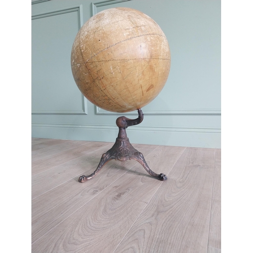 1252 - Early 20th C. world globe on decorative cast iron stand {72 cm H x 40 cm Dia.}.