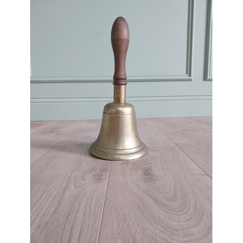 1383 - Good quality early 20th C. brass hand bell with mahogany handle {33 cm H x 16 cm Dia.}.