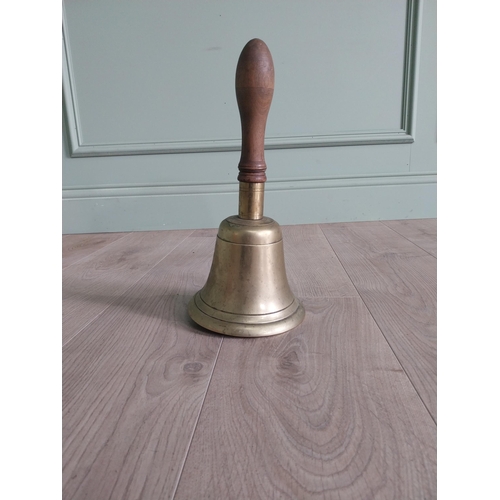 1383 - Good quality early 20th C. brass hand bell with mahogany handle {33 cm H x 16 cm Dia.}.