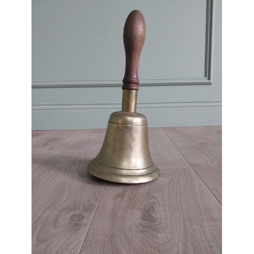 1383 - Good quality early 20th C. brass hand bell with mahogany handle {33 cm H x 16 cm Dia.}.