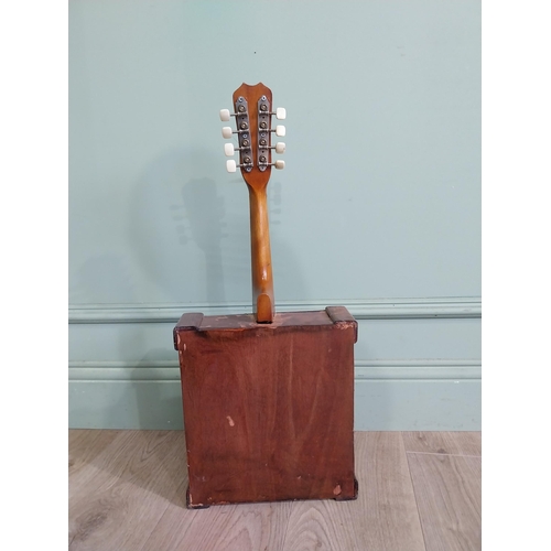 2062 - Eight string box mandolin {63 cm H x 26 cm W x 10 cm D}.