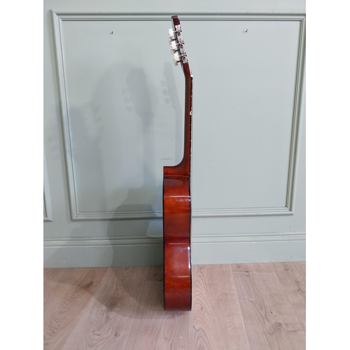 2064 - Herald Model No. HL44 acoustic guitar {101 cm H x 38 cm W x 10 cm D}.