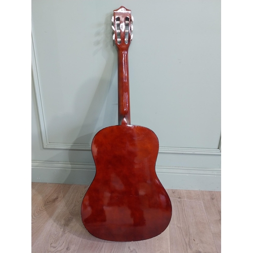 2064 - Herald Model No. HL44 acoustic guitar {101 cm H x 38 cm W x 10 cm D}.