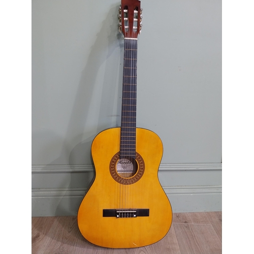 2064 - Herald Model No. HL44 acoustic guitar {101 cm H x 38 cm W x 10 cm D}.