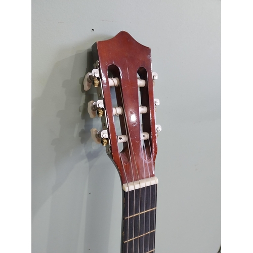 2064 - Herald Model No. HL44 acoustic guitar {101 cm H x 38 cm W x 10 cm D}.