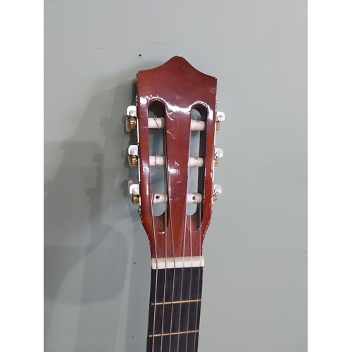 2064 - Herald Model No. HL44 acoustic guitar {101 cm H x 38 cm W x 10 cm D}.