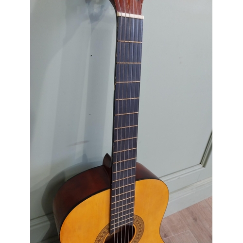 2064 - Herald Model No. HL44 acoustic guitar {101 cm H x 38 cm W x 10 cm D}.