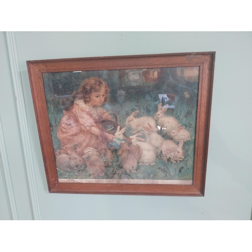 2069 - Edwardian Alice in Wonderland coloured print mounted in oak frame {86 cm H x 67 cm W}.