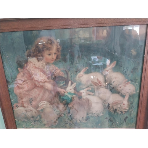 2069 - Edwardian Alice in Wonderland coloured print mounted in oak frame {86 cm H x 67 cm W}.