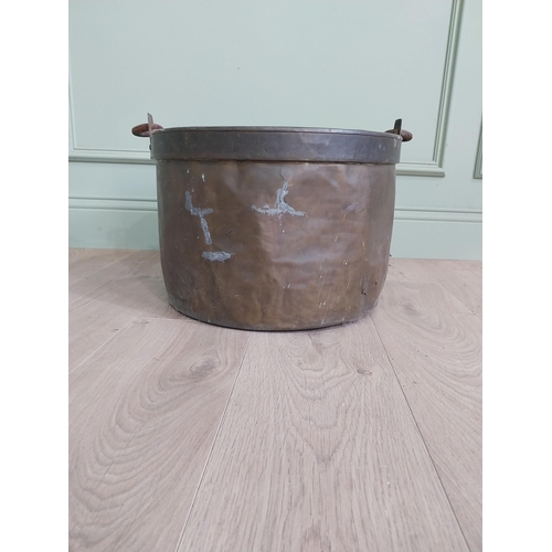 2075 - Early 20th C. copper and brass log bucket with wrought iron handle {53 cm H x 50 cm Dia.}.