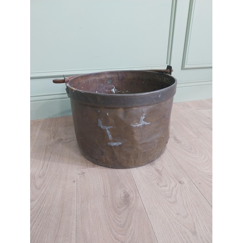 2075 - Early 20th C. copper and brass log bucket with wrought iron handle {53 cm H x 50 cm Dia.}.