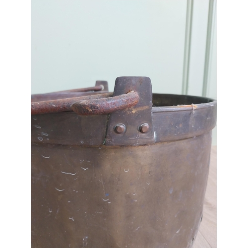 2075 - Early 20th C. copper and brass log bucket with wrought iron handle {53 cm H x 50 cm Dia.}.