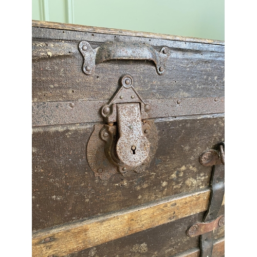 2077 - Two early 20th C. travelling trunks {58 cm H x 87 cm W x 53 cm W and 50 cm H x 96 cm W x 49 cm D}.